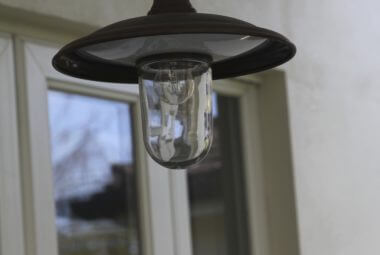 Outdoor pendant light with exposed bulb