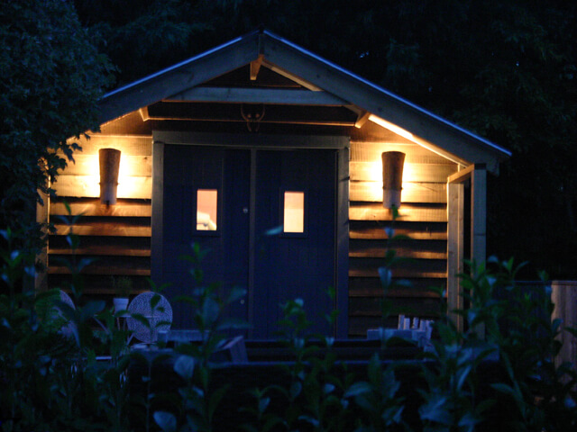 blue garden studio lit at night