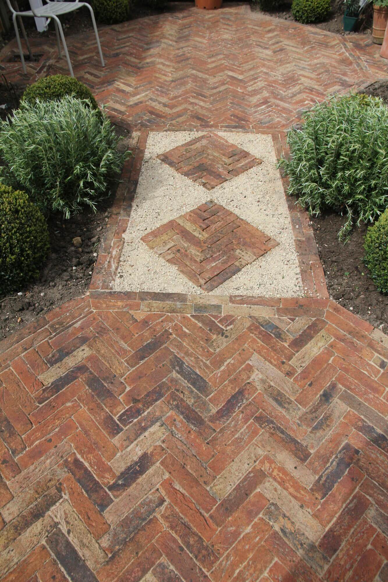 Herringbone laid garden tiles