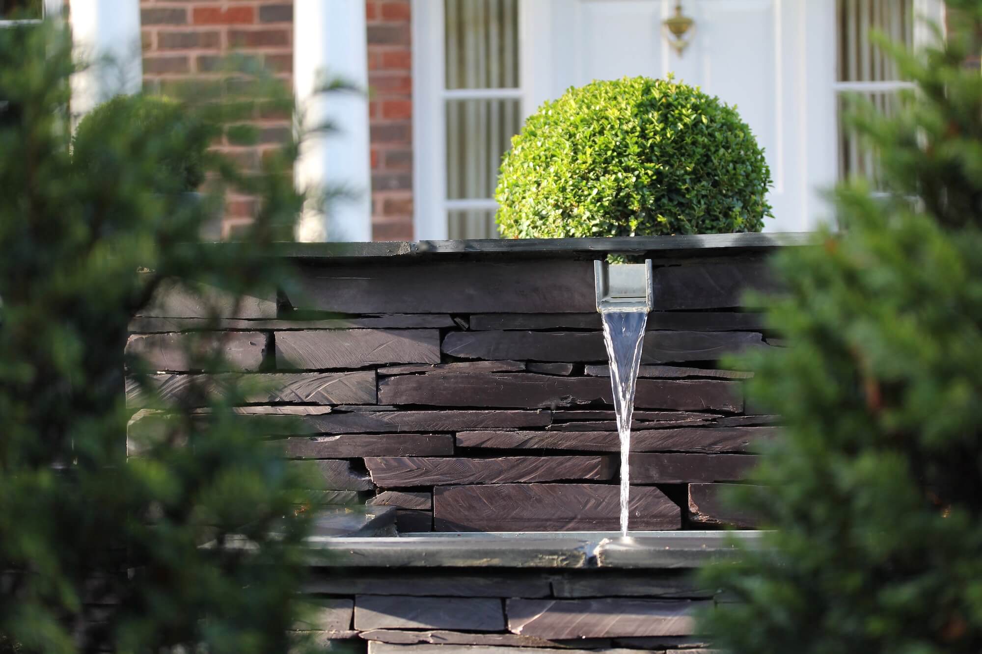 Water feature at front of house