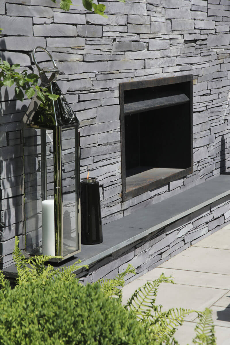 Outdoor fireplace in landscape design Oxfordshire