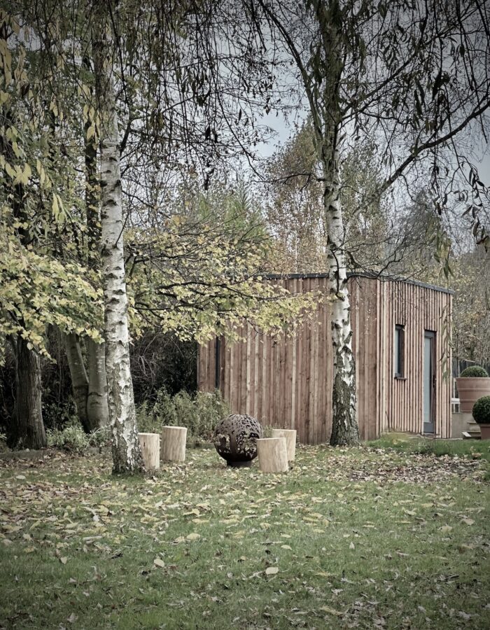 bespoke pool changing room in a scandi inspired cotswold garden design