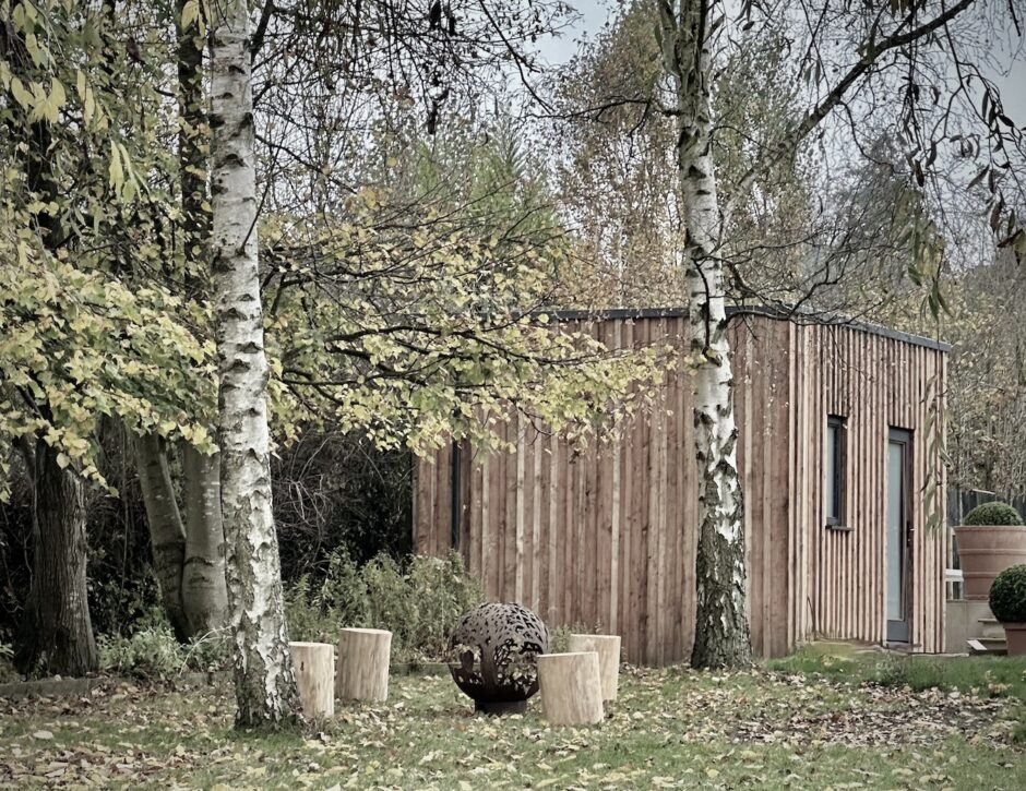 bespoke pool changing room in a scandi inspired cotswold garden design